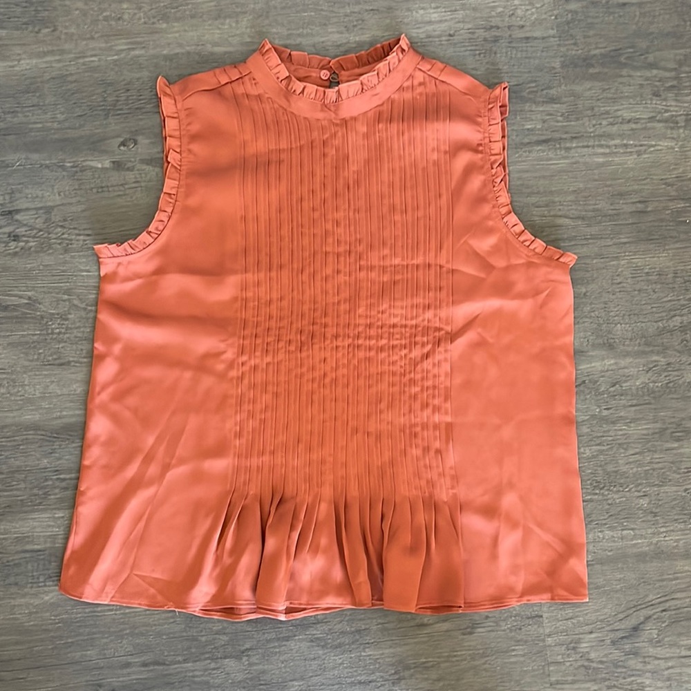 Rust colored professional sleeveless blouse